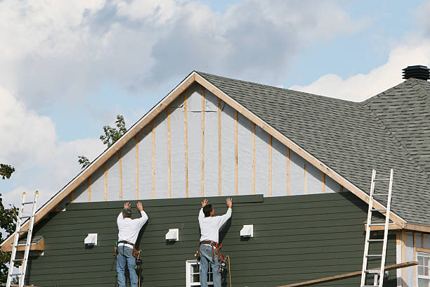 Professional Siding Repair technician working in New Carlisle, IN